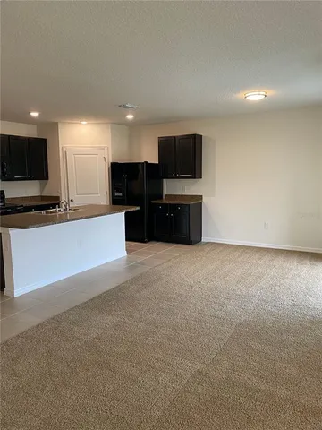 a view of a livingroom with furniture