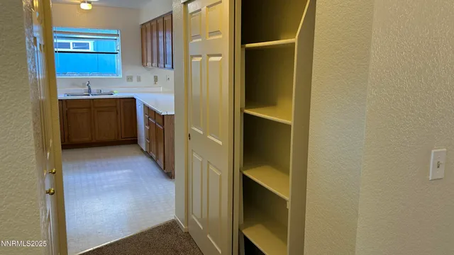 a bathroom with a shower and a mirror