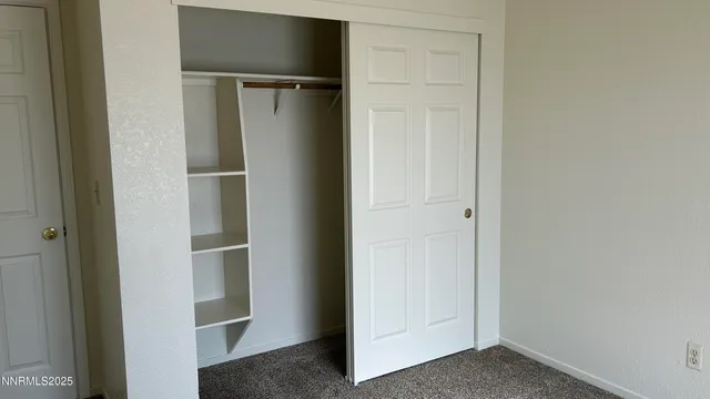 a view of an entryway and a window