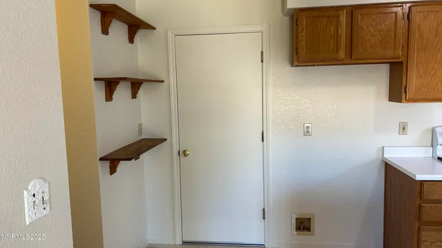 view of a room with a ceiling fan
