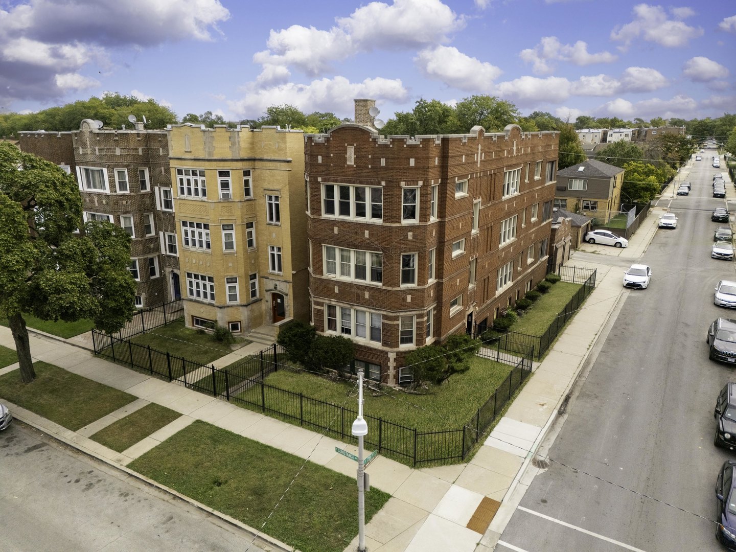 7759 South Constance Avenue Chicago, IL 60649 - Photo 2 of 26 a view of a city with tall buildings
