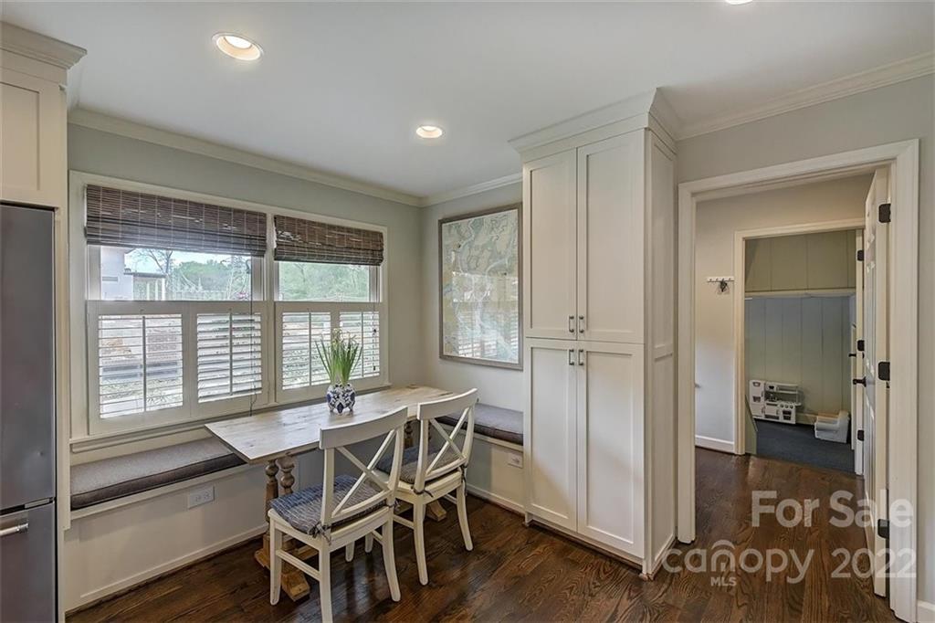 4023 Columbine Circle Charlotte, NC 28211 - Photo 11 of 35 a view of a dining room with furniture window and wooden floor