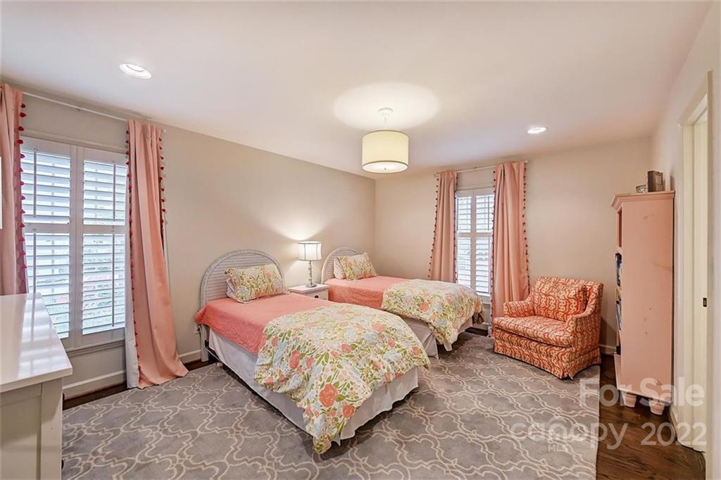 4023 Columbine Circle Charlotte, NC 28211 - Photo 19 of 35 a bedroom with two beds and a couch