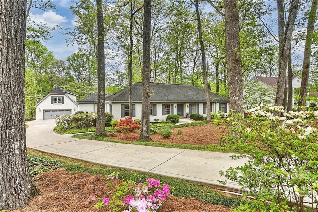 4023 Columbine Circle Charlotte, NC 28211 - Photo 2 of 35 a front view of a house with yard