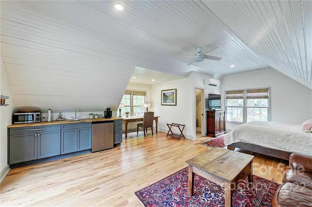 4023 Columbine Circle Charlotte, NC 28211 - Photo 33 of 35 a living room with furniture and wooden floor