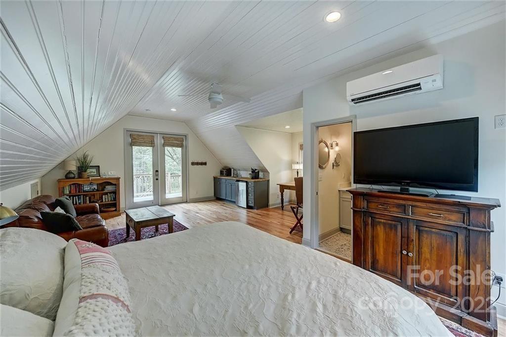 4023 Columbine Circle Charlotte, NC 28211 - Photo 34 of 35 a living room with furniture and a flat screen tv