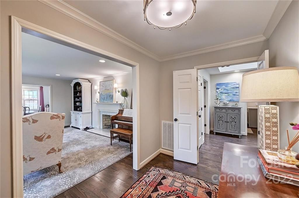 4023 Columbine Circle Charlotte, NC 28211 - Photo 4 of 35 a living room with furniture and a wooden floor