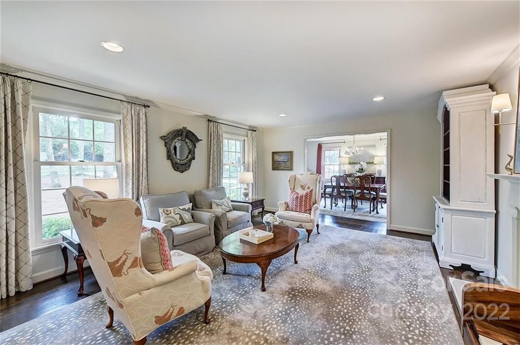 4023 Columbine Circle Charlotte, NC 28211 - Photo 5 of 35 a living room with furniture a rug and a window