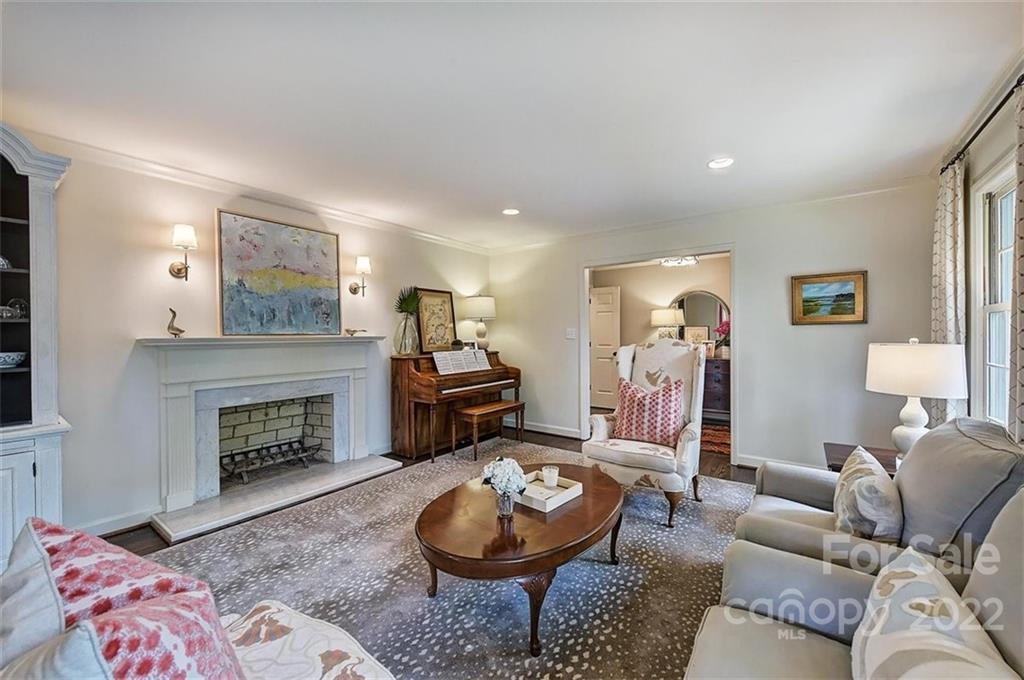 4023 Columbine Circle Charlotte, NC 28211 - Photo 6 of 35 a living room with furniture and a fireplace