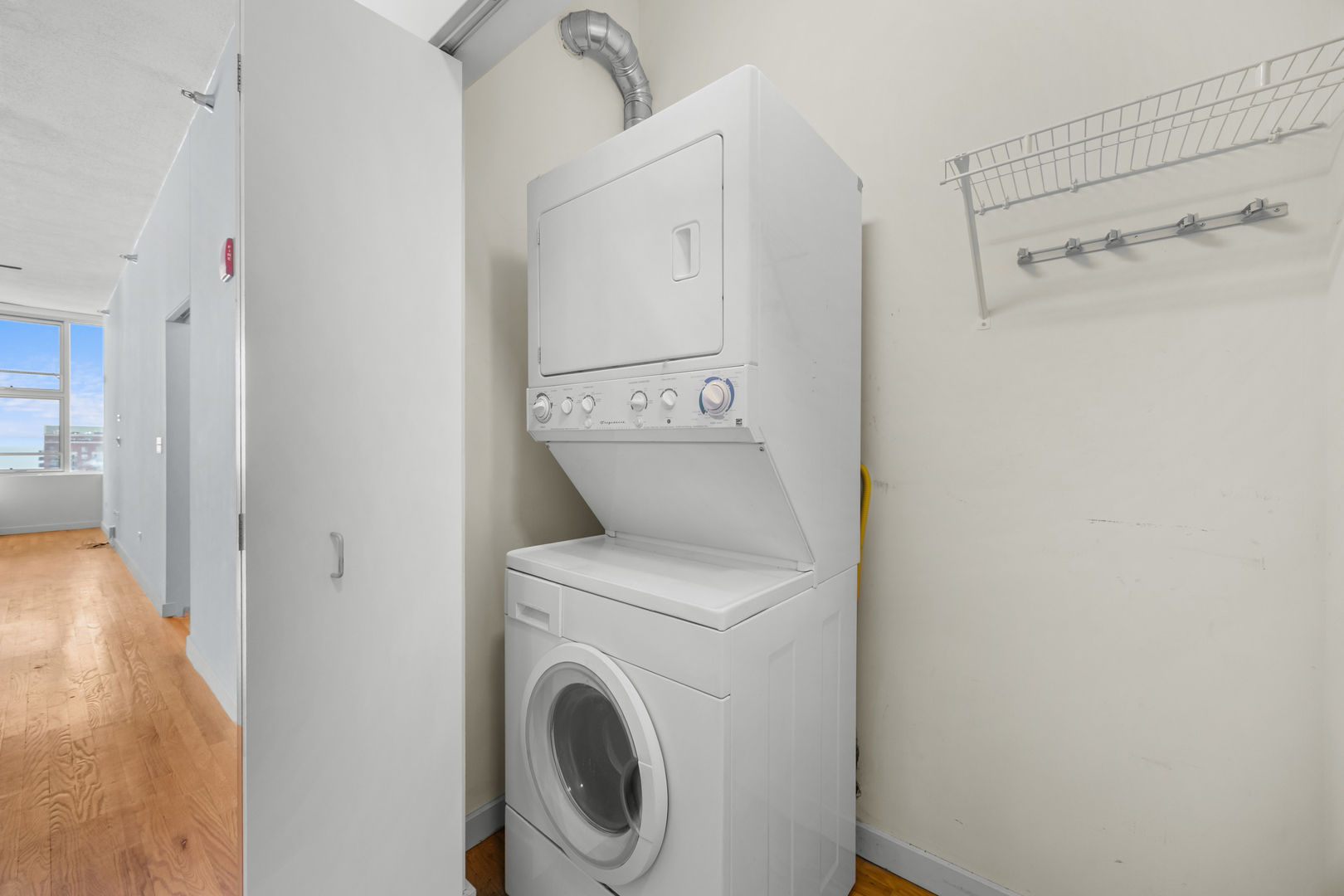 1720 South Michigan Avenue, Unit 2307 Chicago, IL 60616 - Photo 11 of 15 a utility room with dryer and washer