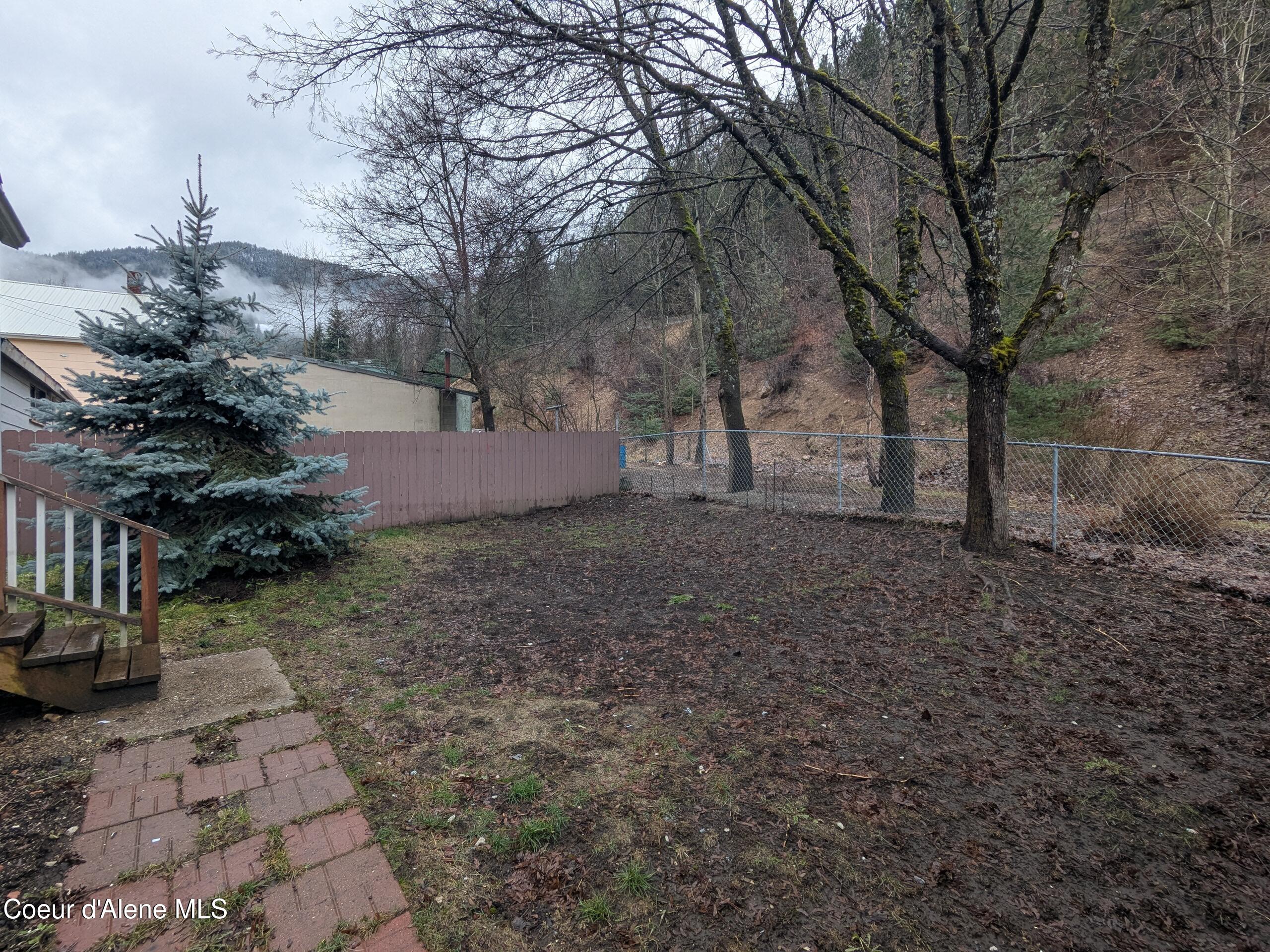 402 Main Street Wardner, ID 83837 - Photo 27 of 32 Back Yard From Driveway