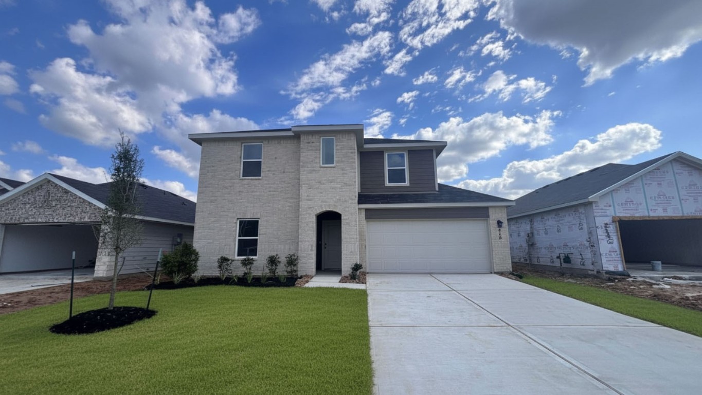 a front view of house with yard