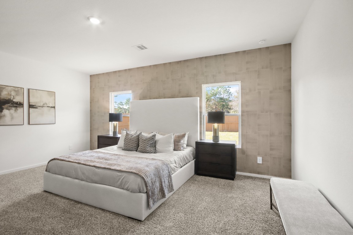 540 Wax Myrtle Way Hockley, TX 77447 - Photo 11 of 25 a bedroom with a bed and lamp