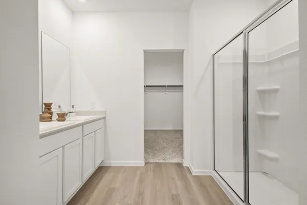 a bathroom with a sink and mirror