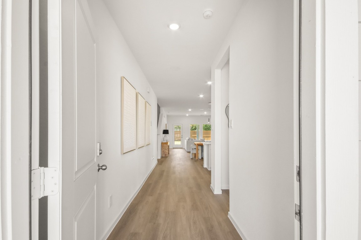 540 Wax Myrtle Way Hockley, TX 77447 - Photo 2 of 25 a view of hallway with wooden floor