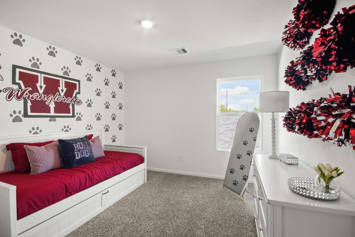540 Wax Myrtle Way Hockley, TX 77447 - Photo 21 of 25 a living room with furniture and flowers