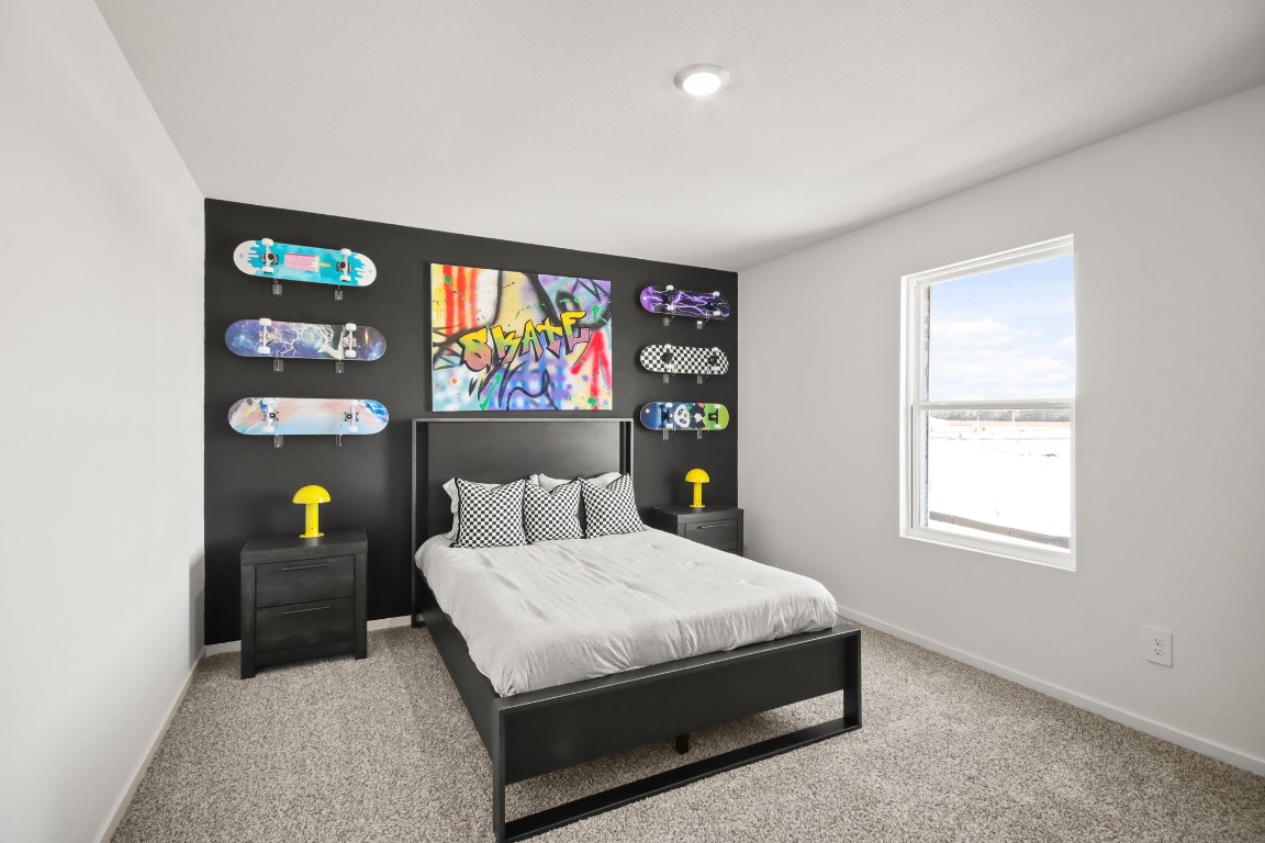 540 Wax Myrtle Way Hockley, TX 77447 - Photo 23 of 25 a bedroom with a bed and furniture