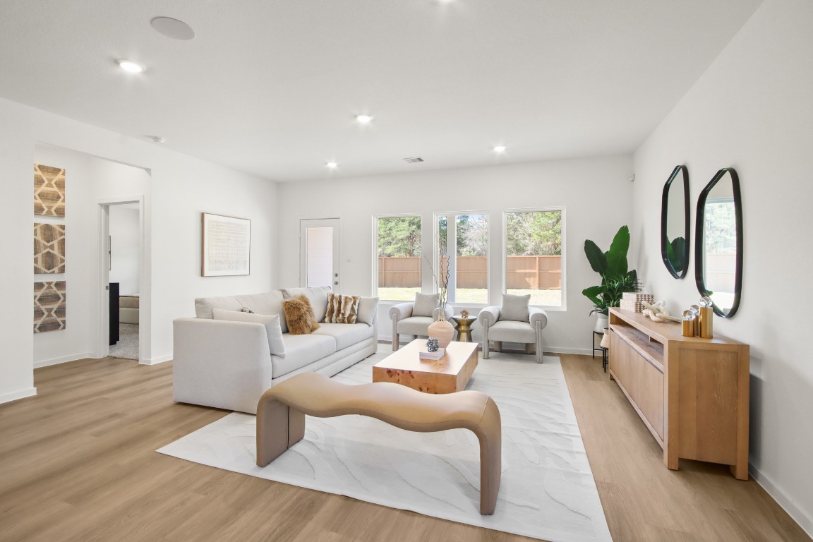 540 Wax Myrtle Way Hockley, TX 77447 - Photo 3 of 25 a living room with furniture large window and wooden floor