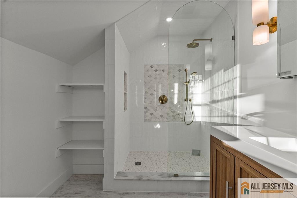 143 Maple Avenue Chester, NJ 07930 - Photo 19 of 52 a bathroom with a shower