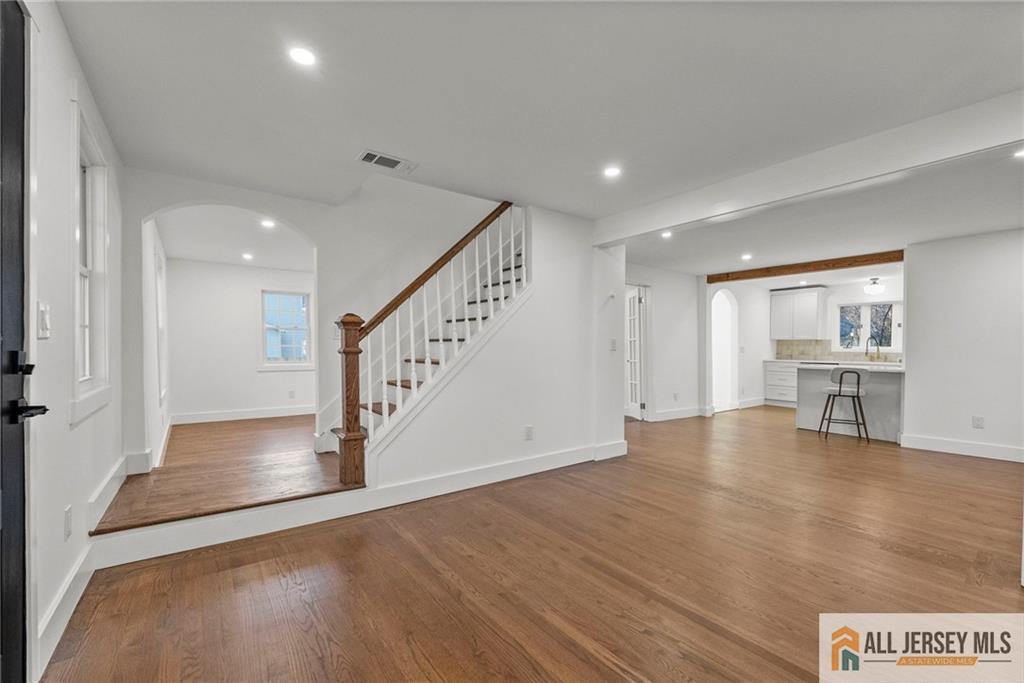 143 Maple Avenue Chester, NJ 07930 - Photo 25 of 52 a view of an empty room with wooden floor