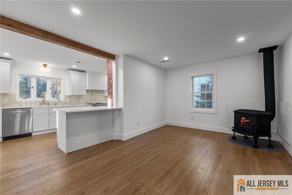 143 Maple Avenue Chester, NJ 07930 - Photo 28 of 52 a view of kitchen with wooden floor and electronic appliances