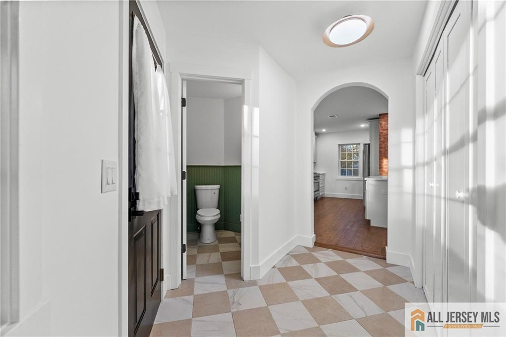 143 Maple Avenue Chester, NJ 07930 - Photo 40 of 52 a view of a hallway with a living room