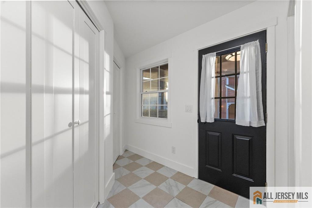 143 Maple Avenue Chester, NJ 07930 - Photo 41 of 52 a view of an entryway with wooden floor