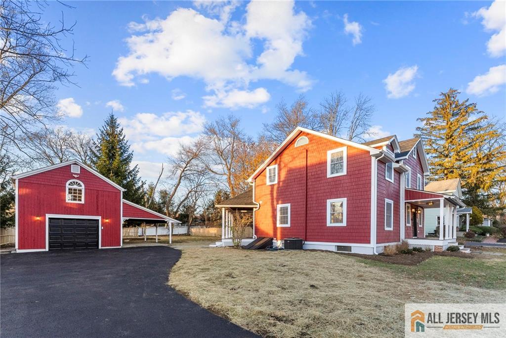 143 Maple Avenue Chester, NJ 07930 - Photo 42 of 52 a view of a house with a yard