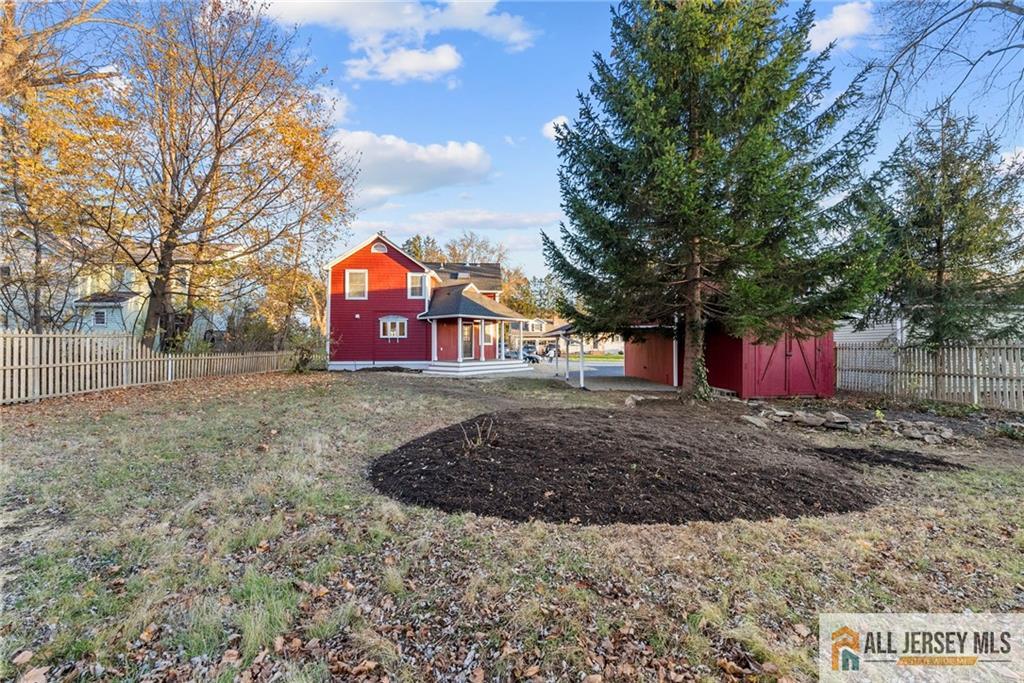 143 Maple Avenue Chester, NJ 07930 - Photo 45 of 52 front view of a house with a yard