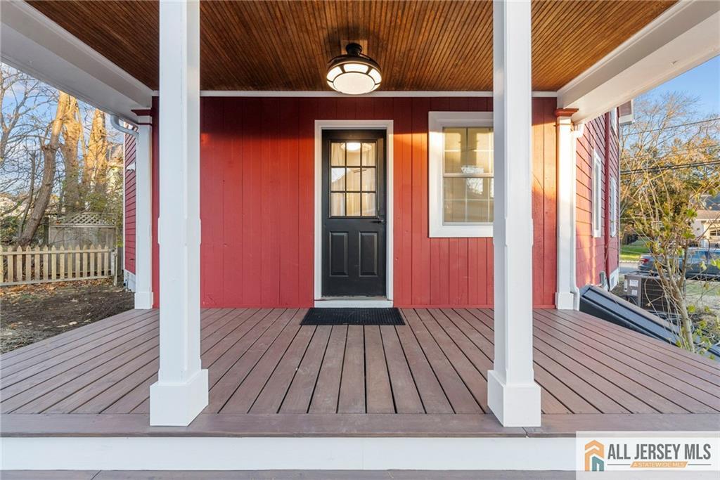143 Maple Avenue Chester, NJ 07930 - Photo 46 of 52 a view of a balcony with wooden floor