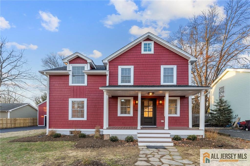 143 Maple Avenue Chester, NJ 07930 - Photo 49 of 52 a front view of a house with garden