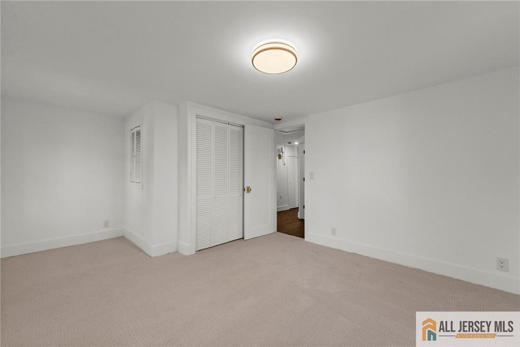 143 Maple Avenue Chester, NJ 07930 - Photo 7 of 52 a view of an empty room