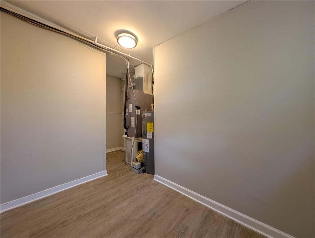 1672 Thornton Place Southwest Atlanta, GA 30315 - Photo 19 of 35 a view of small space with wooden floor
