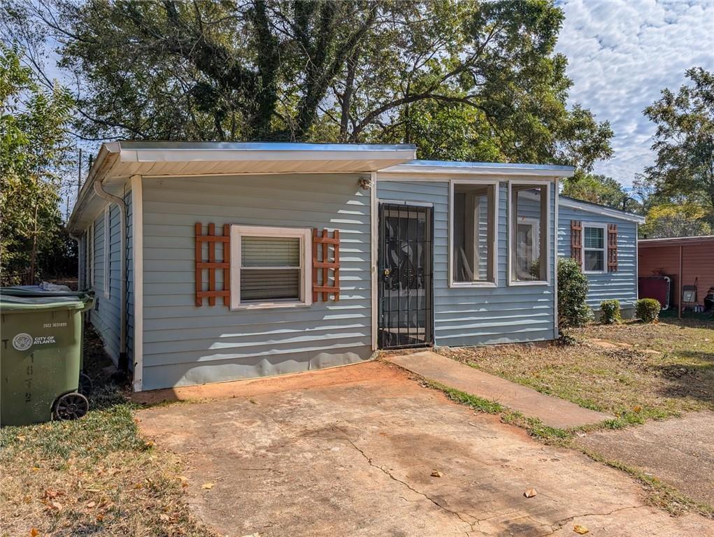 1672 Thornton Place Southwest Atlanta, GA 30315 - Photo 2 of 35 a view of a house with a patio