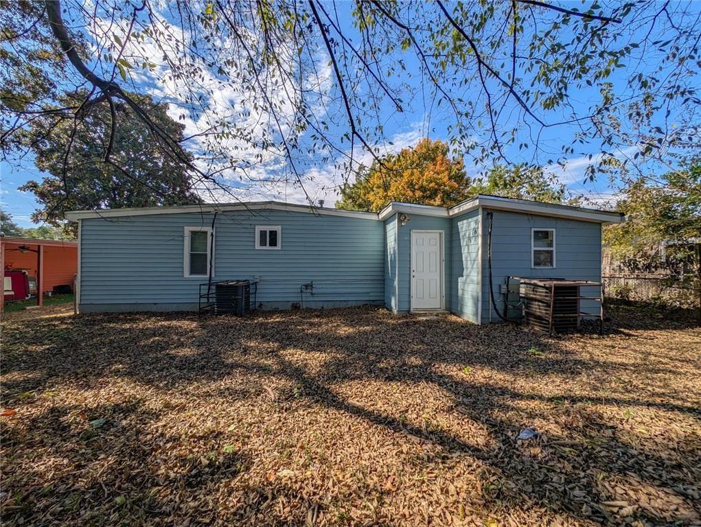 1672 Thornton Place Southwest Atlanta, GA 30315 - Photo 35 of 35 a view of a house with a yard and garage