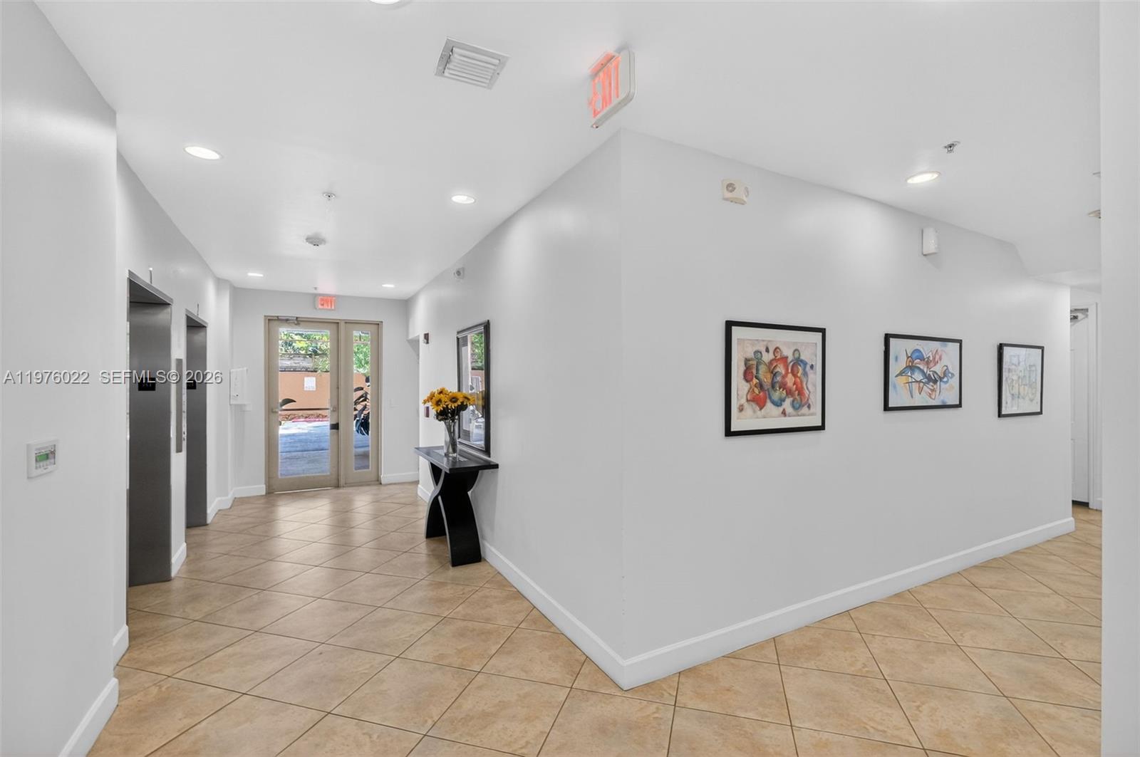 2630 Southwest 28th Street, Unit 51 Miami, FL 33133 - Photo 26 of 33 a view of a hallway with closet