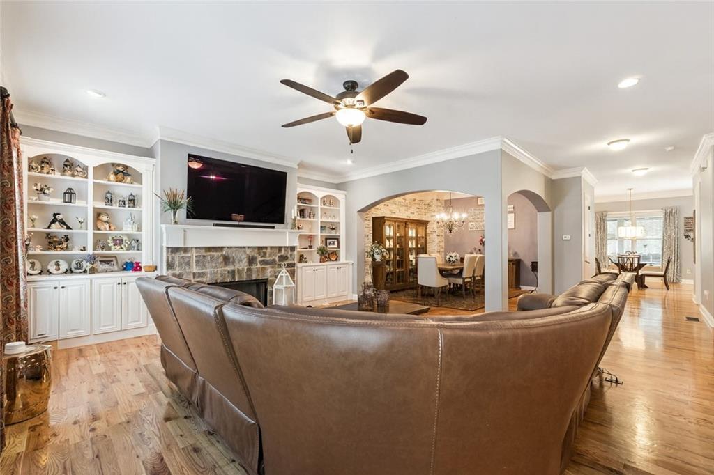 217 Trecastle Square Canton, GA 30114 - Photo 21 of 43 a living room with fireplace furniture and a flat screen tv