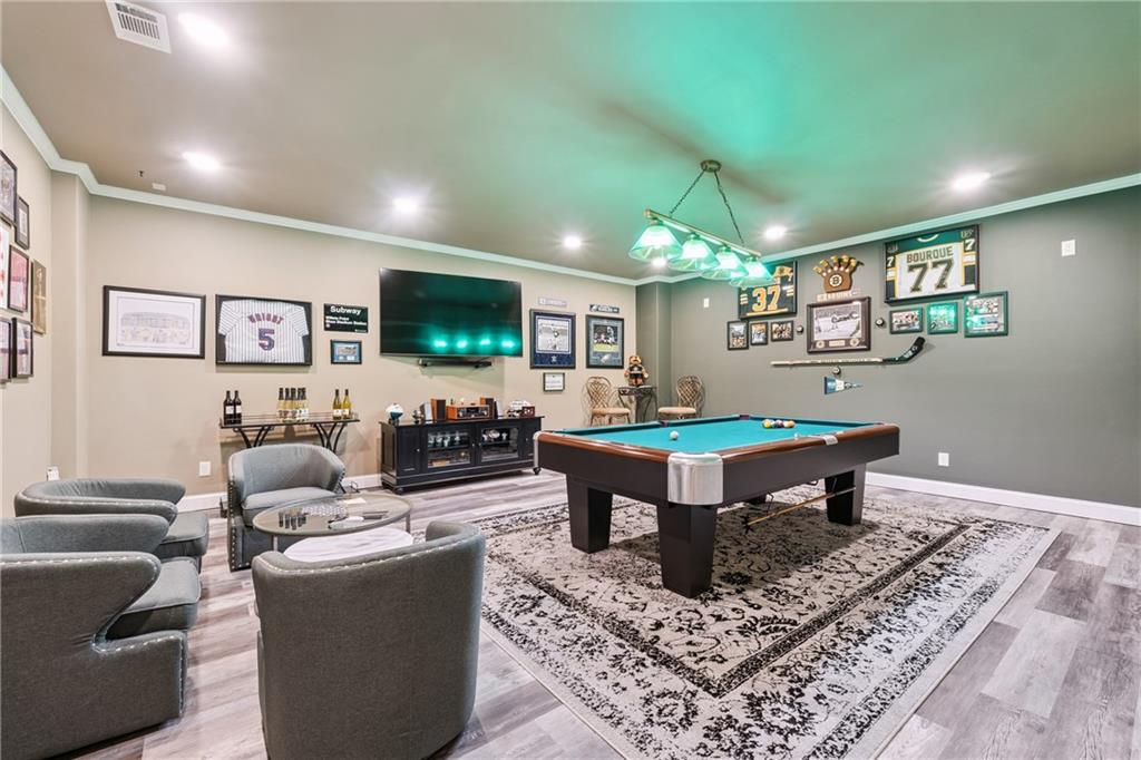 217 Trecastle Square Canton, GA 30114 - Photo 35 of 43 a living room with furniture and a flat screen tv