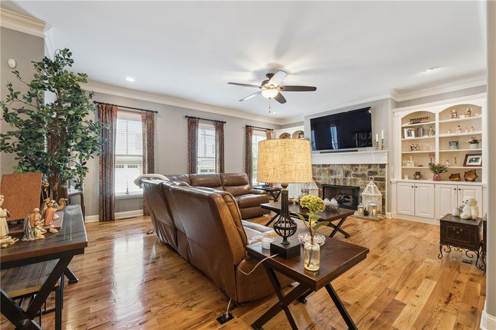 217 Trecastle Square Canton, GA 30114 - Photo 4 of 43 a view of a dining room with furniture window and wooden floor