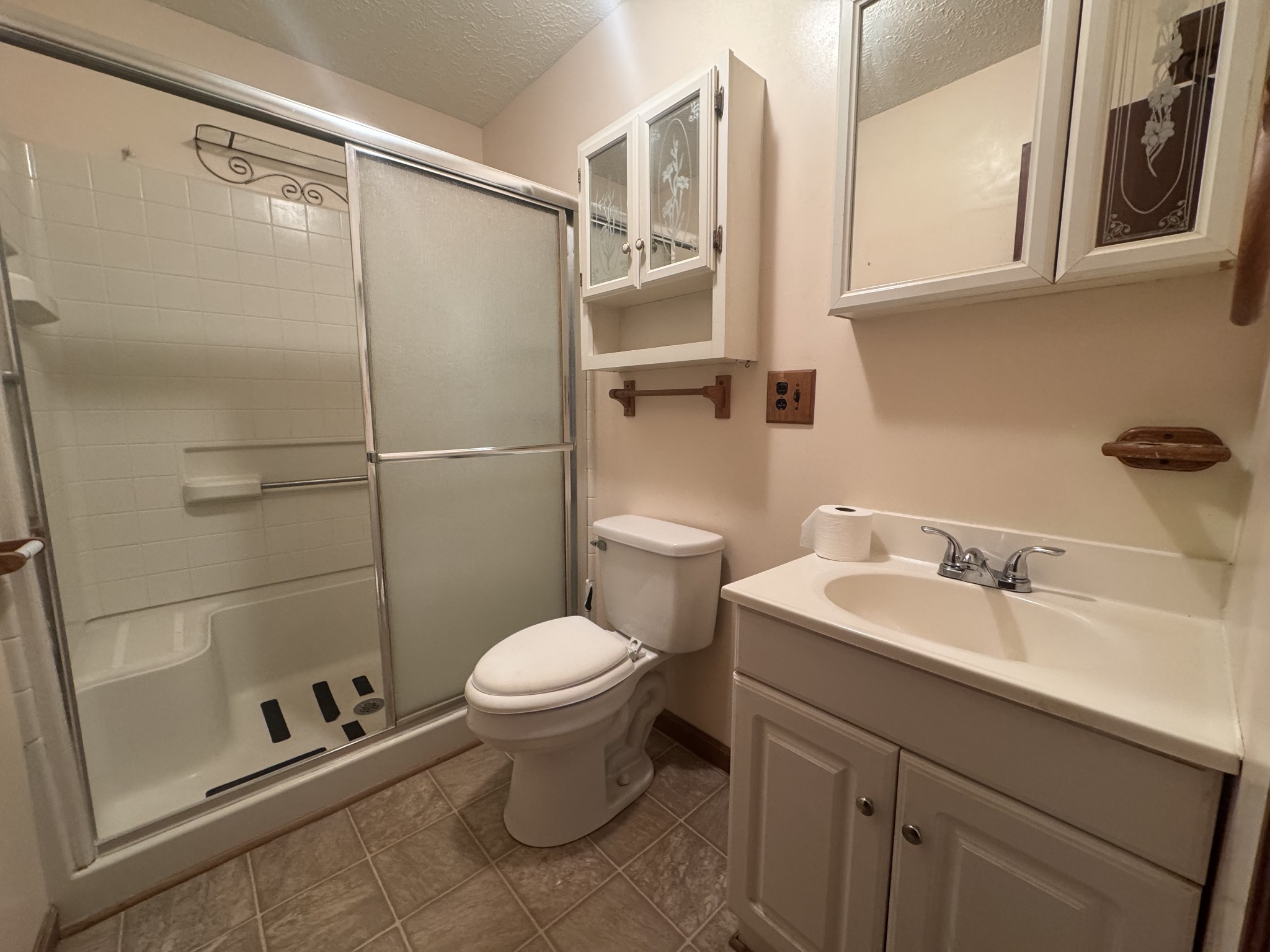 934 Jordan Circle White Bluff, TN 37187 - Photo 11 of 24 a bathroom with a sink a toilet and shower