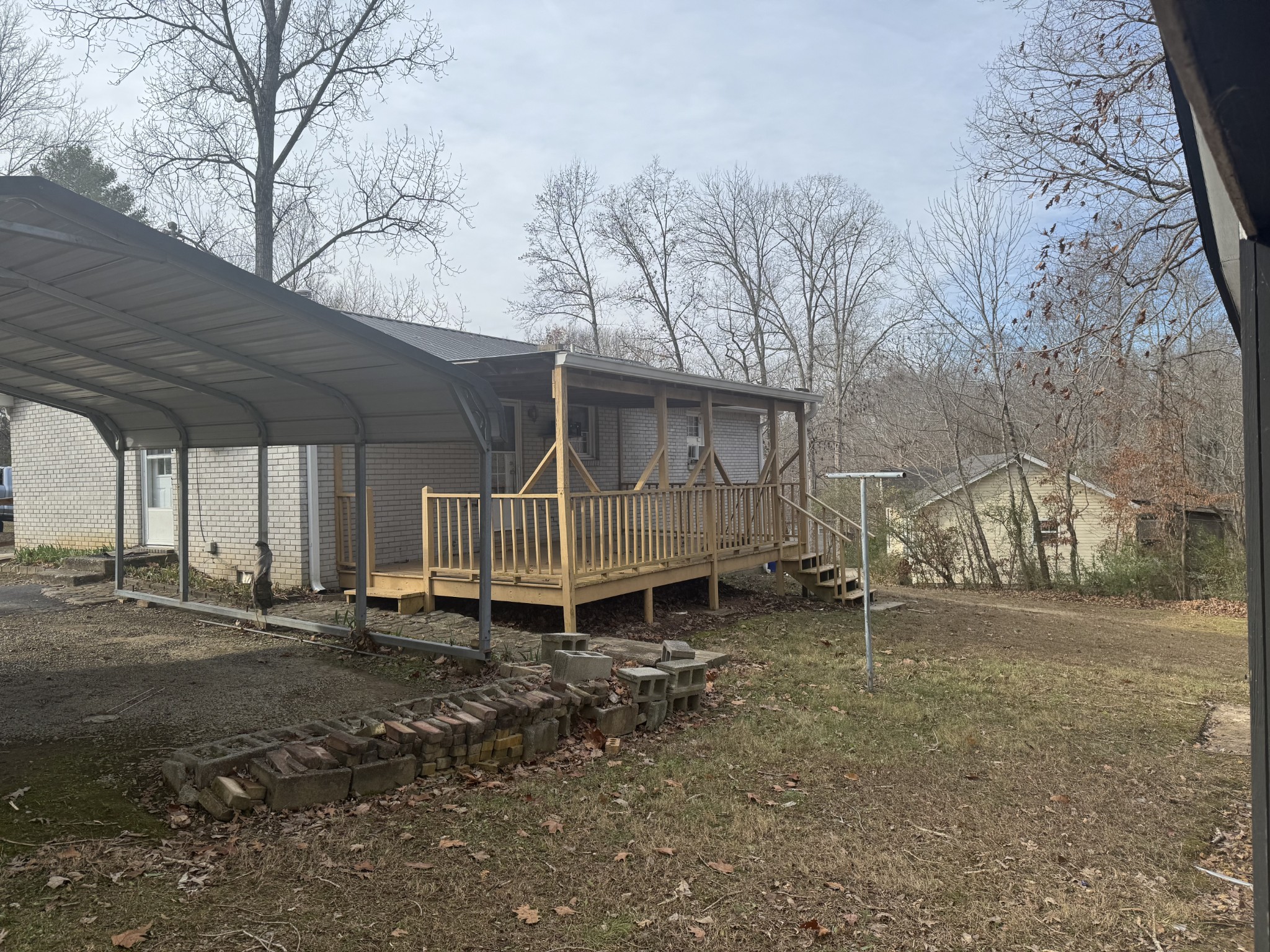 934 Jordan Circle White Bluff, TN 37187 - Photo 20 of 24 a barn is sitting in the middle of a yard