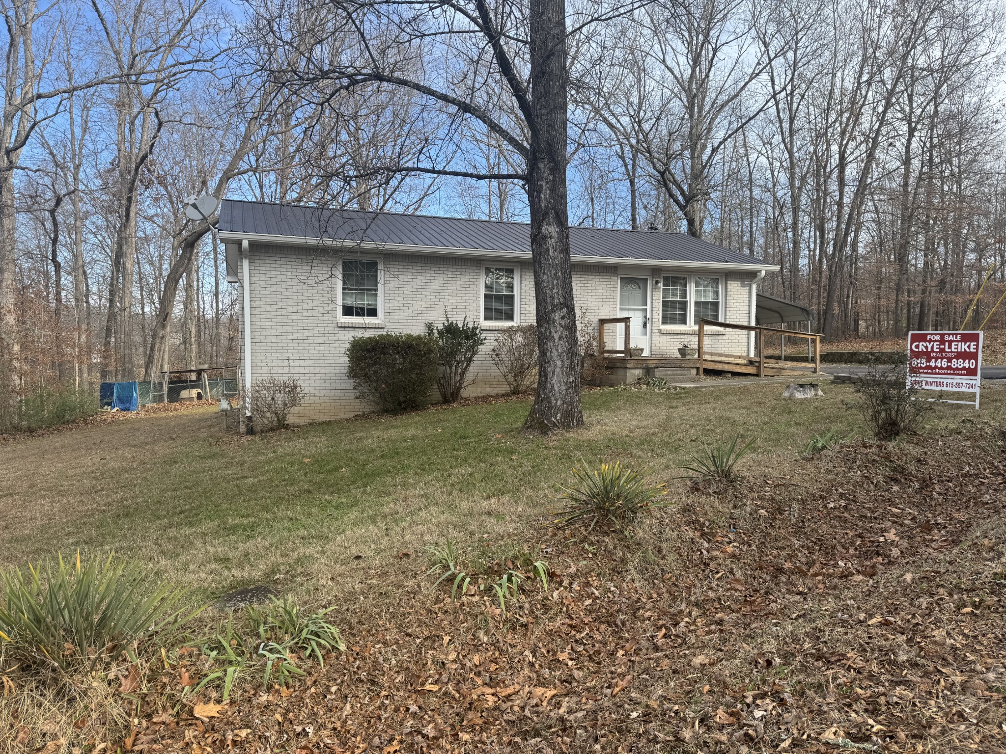 934 Jordan Circle White Bluff, TN 37187 - Photo 2 of 24 a front view of a house with a yard and garage
