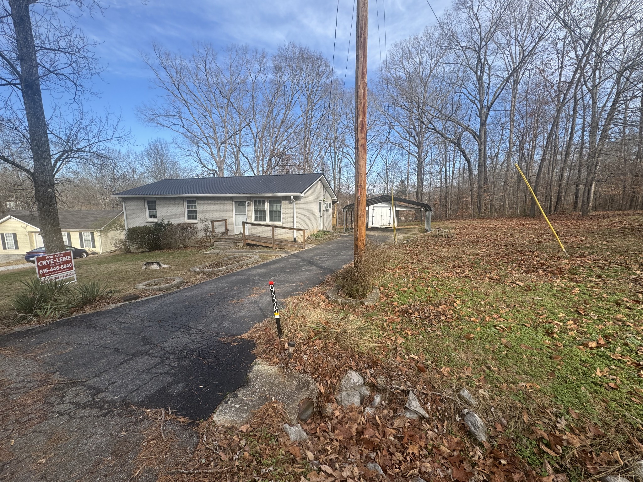 934 Jordan Circle White Bluff, TN 37187 - Photo 22 of 24 a backyard of a house with oven and trees