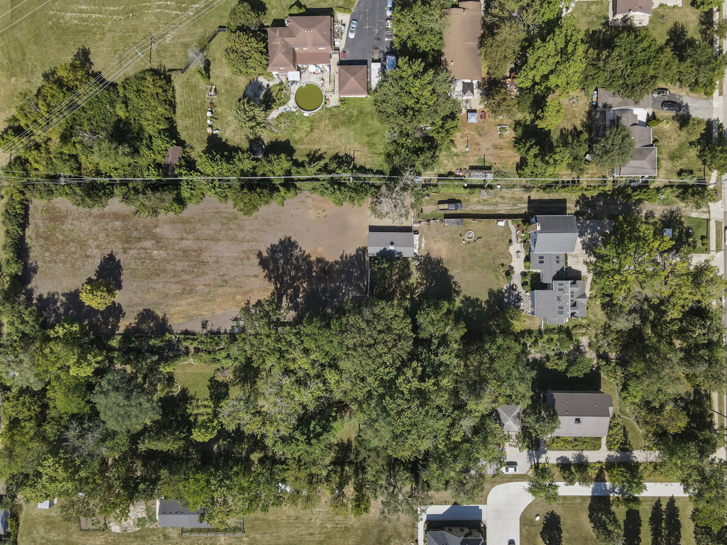 2-n584 South Ardmore Avenue Addison, IL 60101 - Photo 33 of 34 an aerial view of a house with a lake view