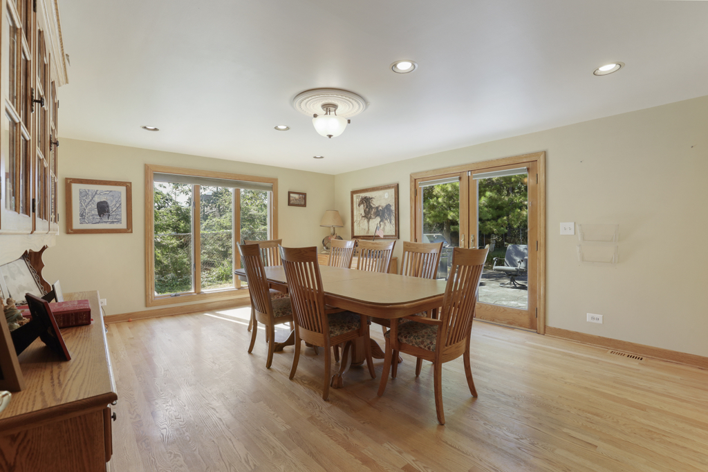 2-n584 South Ardmore Avenue Addison, IL 60101 - Photo 10 of 34 a view of a dining room with furniture window and wooden floor