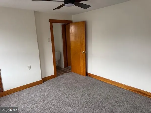 an empty room with a door
