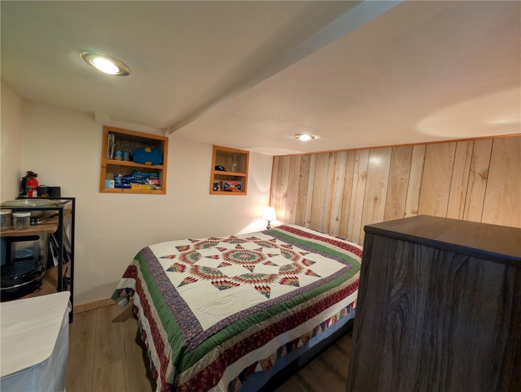 2117 Badger Creek Road Hartsel, CO 80449 - Photo 13 of 46 a bed sitting in a bedroom next to a window
