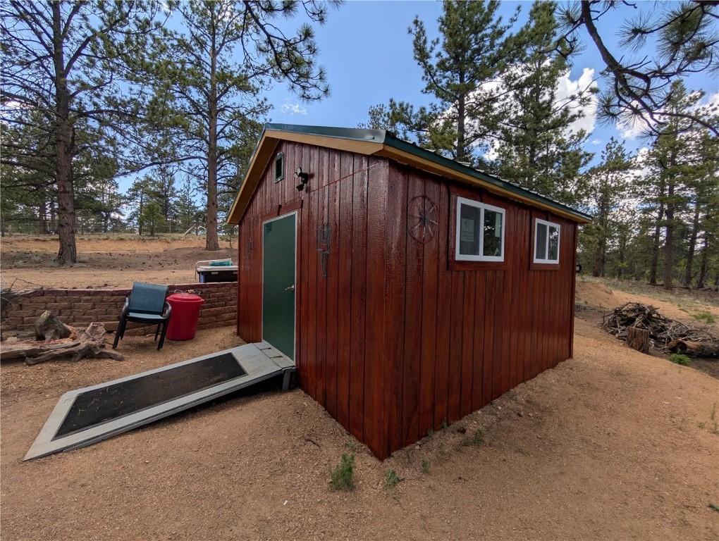 2117 Badger Creek Road Hartsel, CO 80449 - Photo 37 of 46 a view of a car park in front of house