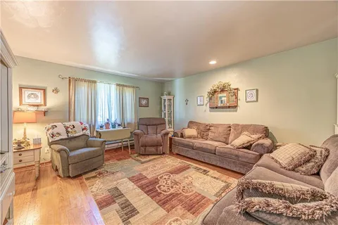 a living room with furniture and a couch