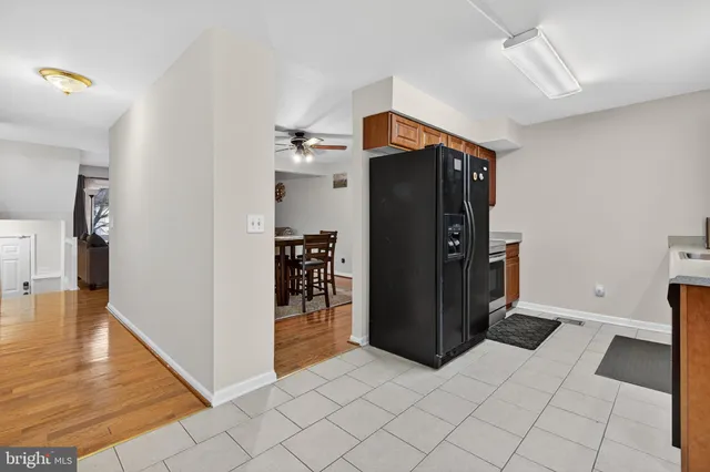 a utility room with cabinets dryer and washer